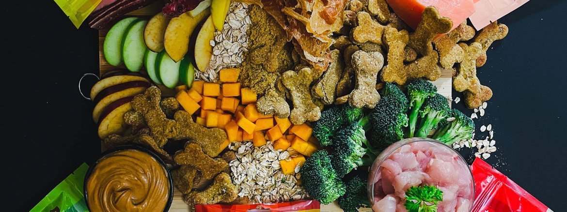 Board of the whole food ingredients that go into Little Feet treats